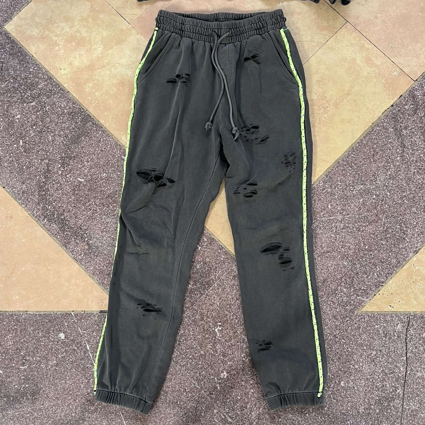 Distressed green pants