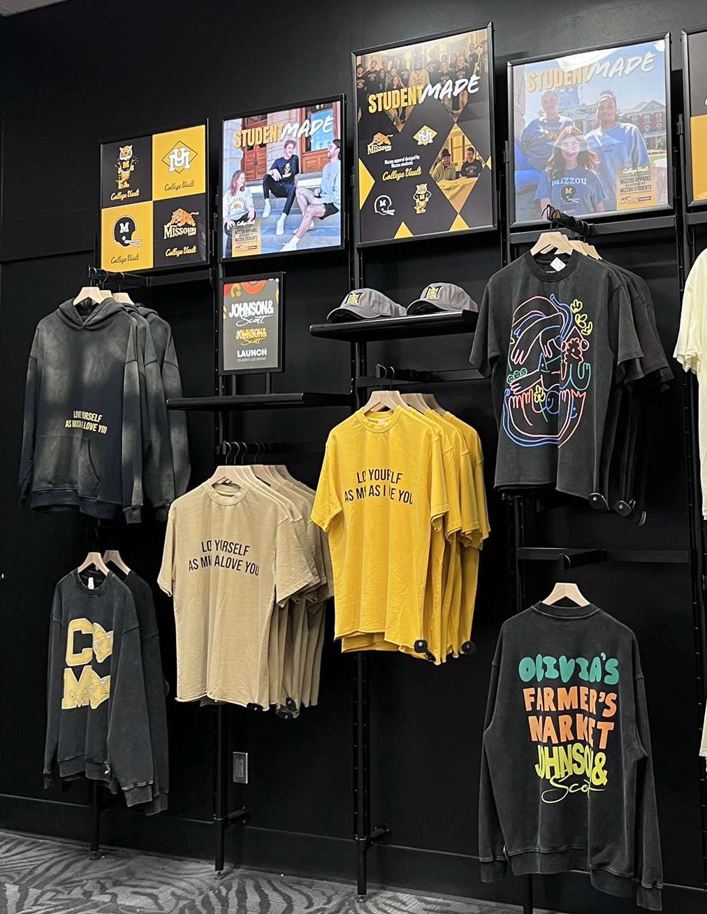 A JOHNSONANDSCOTT retail display inside the official Mizzou bookstore.