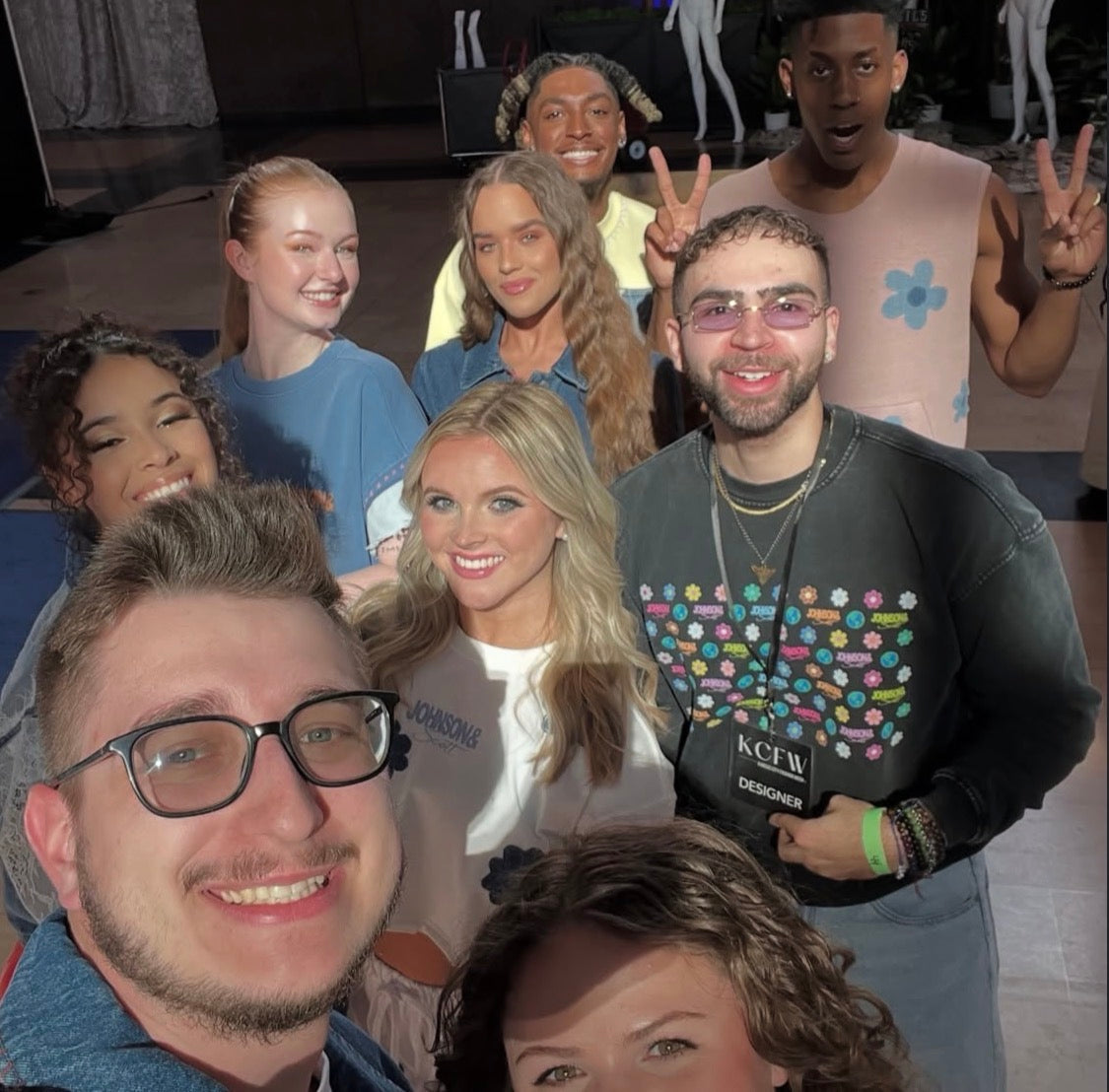 The JOHNSONANDSCOTT team and models backstage during the Denim Diaries runway presentation.