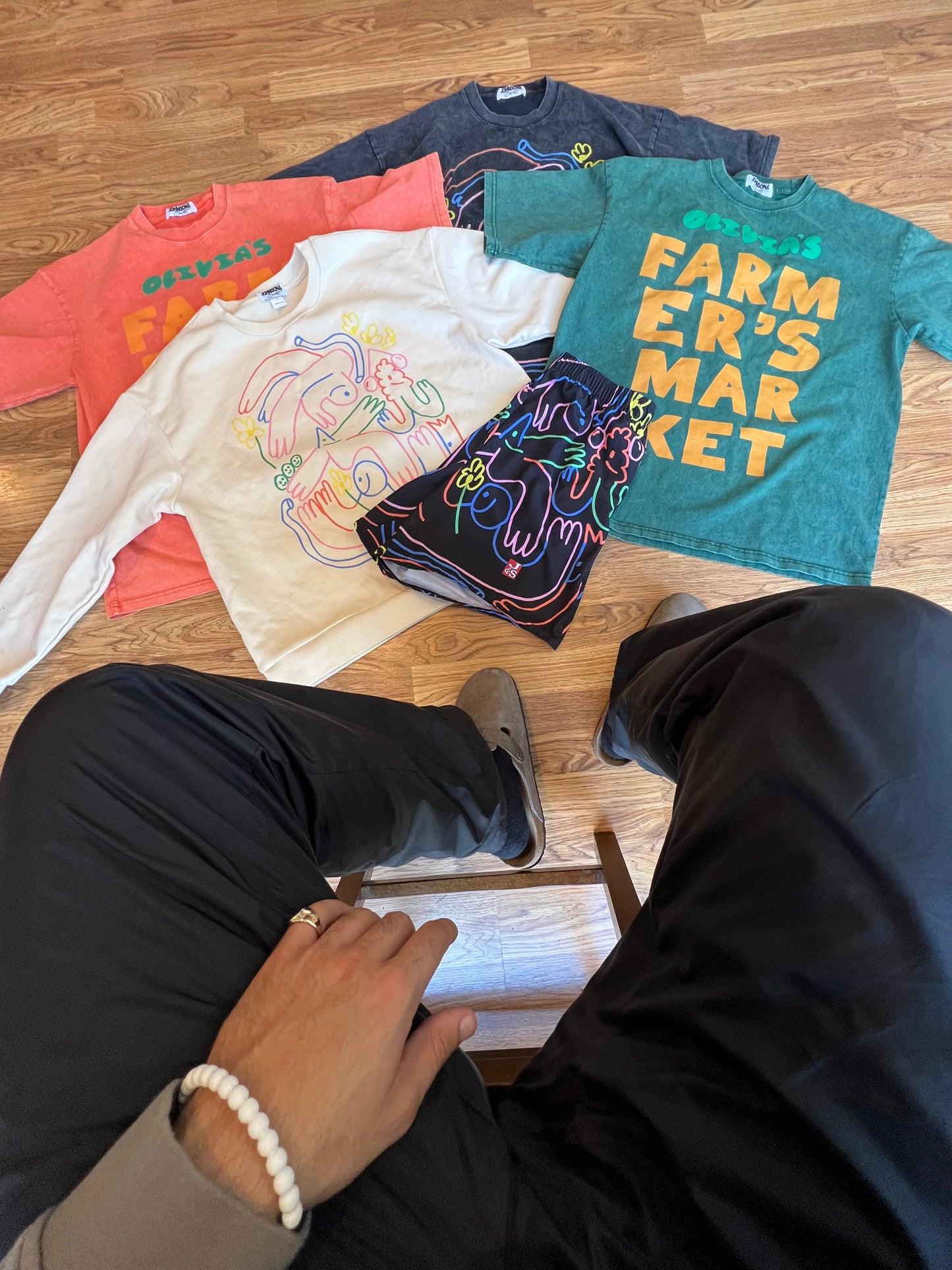 Colorful garments from the JOHNSONANDSCOTT and Olivia’s Farmers Market collaboration.