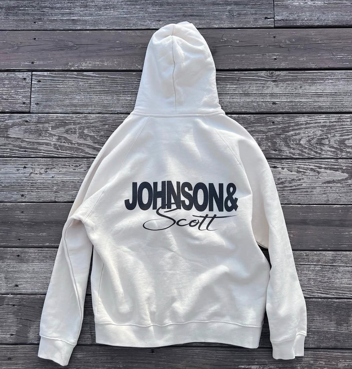 Back flat lay of white Tiger Full Zip Hoodie with black JOHNSONANDSCOTT signature
