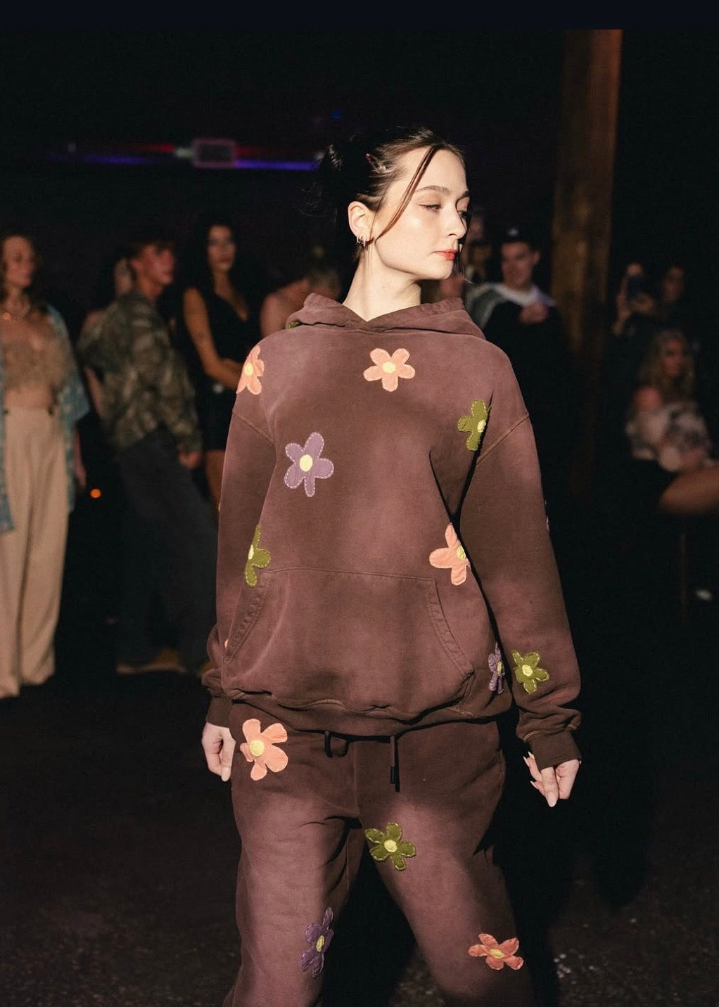 Model wearing a hand-reworked floral JOHNSONANDSCOTT runway look